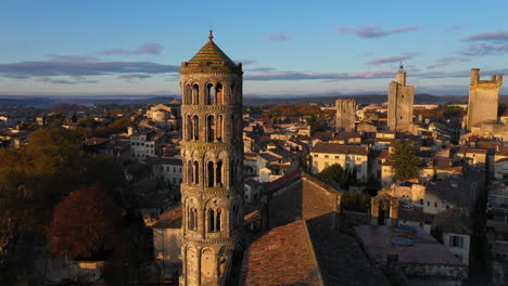 Saint-Théodorit-cathedral-and-its-Fenestrelle-Tower-aerial-flight-during-sunrise